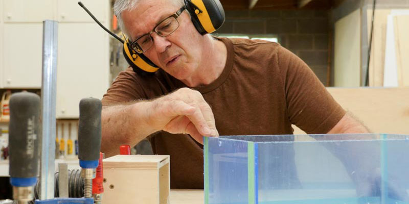 Dan working with plexiglass