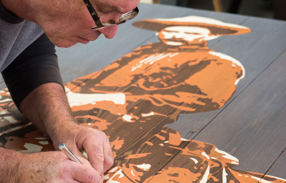 Dan Miller doing some finishing work on the Chisholm Trail traveling exhibit.