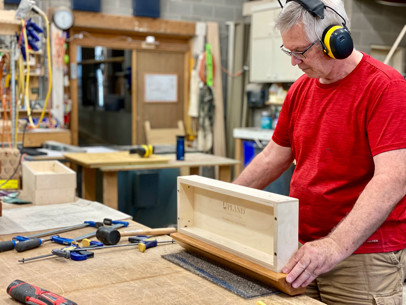 Dan Miller assembling a sign base in our fabrication shop.