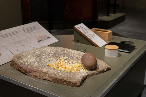 Custom-fabricated, interactive corn grinding station