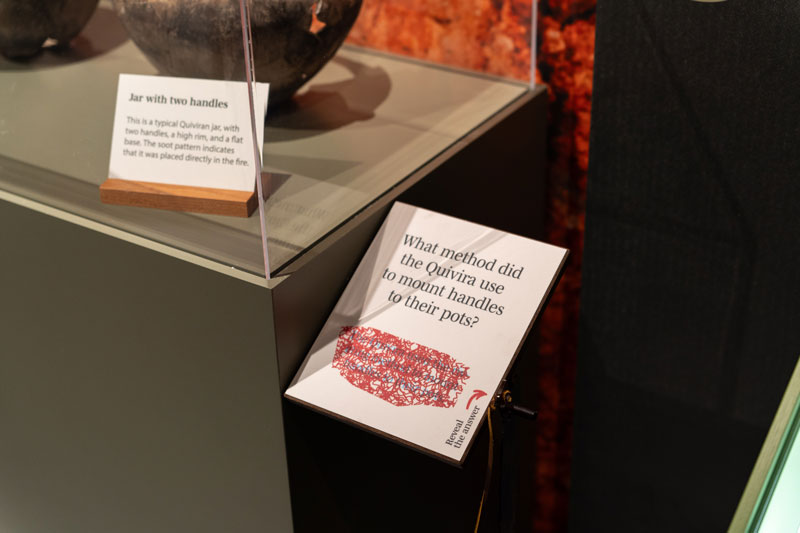 Throughout the exhibit there are small panels with questions relating to the text. You can use the attached clear, red 'revealer' to see the answer hiding in the red pattern.