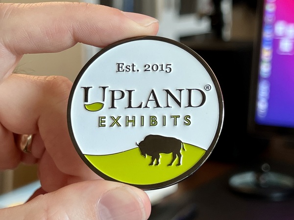 upland logo coin
