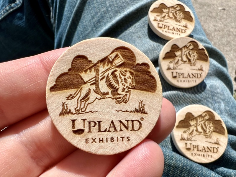 Upland coins in hand
