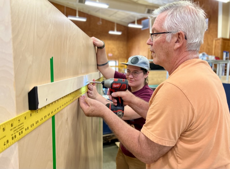 installing exhibit title panel